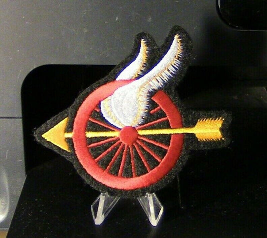 Motorcycle Memorabilia: Red Wheel/Yellow Arrow & White Wings Patch (Arrow Left)