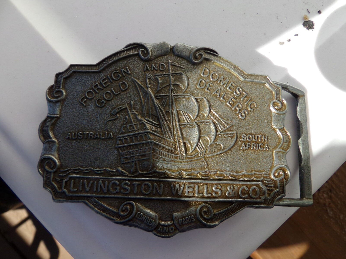 Livingston Wells & Co Foreign & Domestic Gold Dealers Advertising Belt Buckle