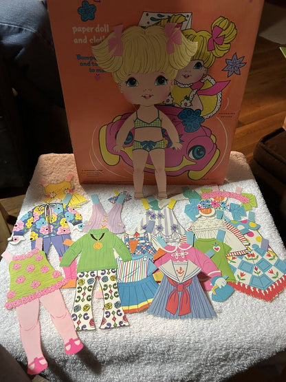 WHITMAN BABY GO BYE BYE PAPER DOLL AND CLOTHES ( BUGGY NOT INCLUDED) 1971