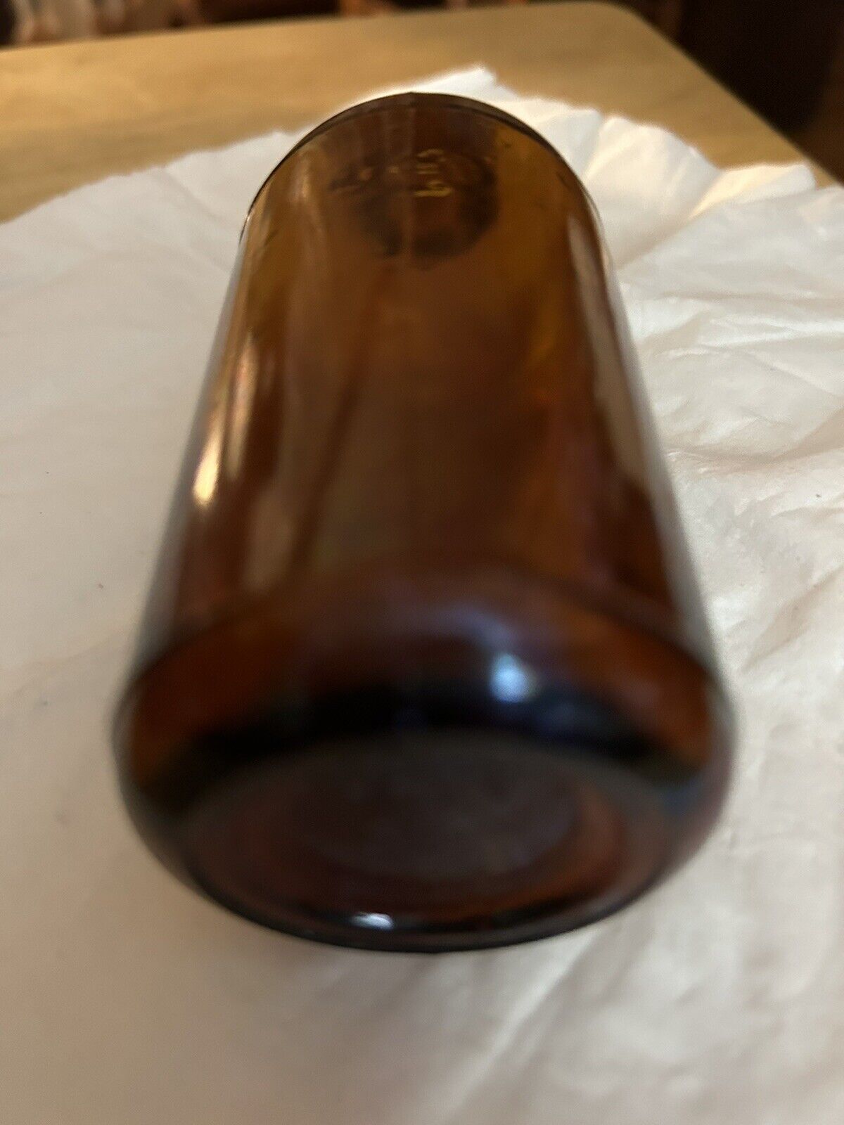 BROWN ROUND BOTTLE UNMARKED 4.5 X 1.75 INCHES EMPTY