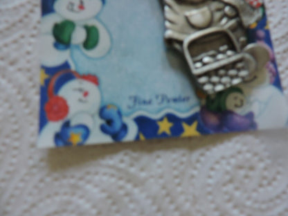 A LINDSAY CLAIRE DESIGN PEWTER SMOWWOMAN ORNAMENT