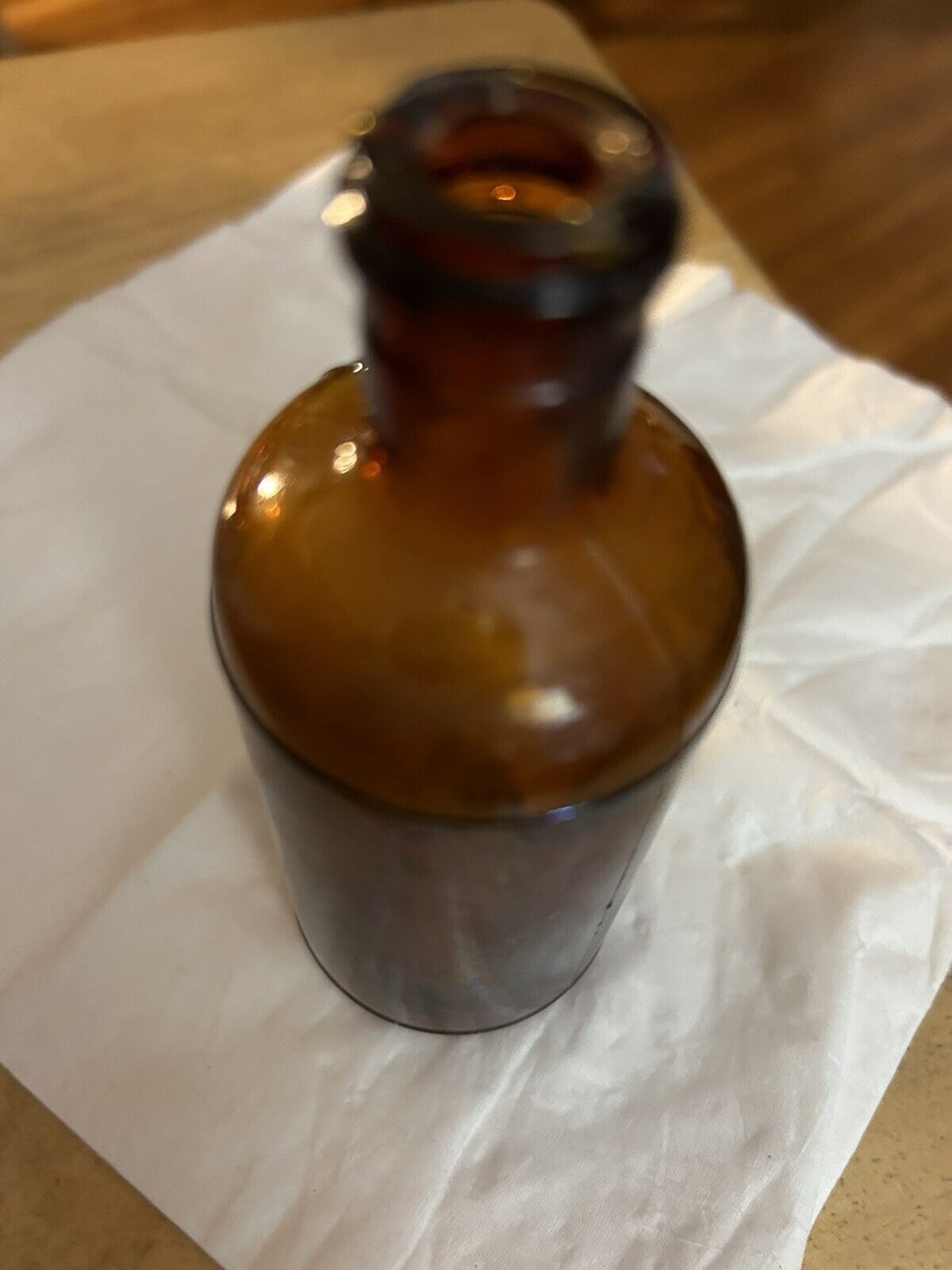BROWN ROUND BOTTLE UNMARKED 4.5 X 1.75 INCHES EMPTY