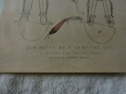 FEBRUARY 1914: " OUR BETTY AS A CAMP FIRE GIRL" CUT OUT: DESIGNED BY MARGARET PE