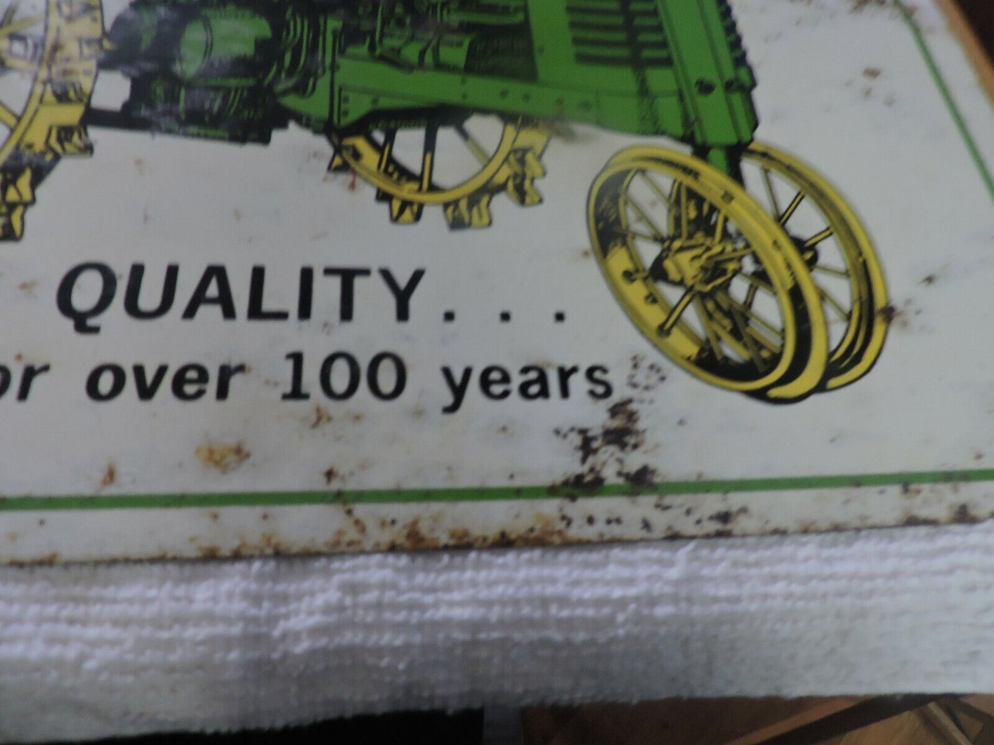 JOHN DEERE TRACTOR " QUALITY...FOR OVER 100 YEARS" METAL SIGN 16X12 INCHES
