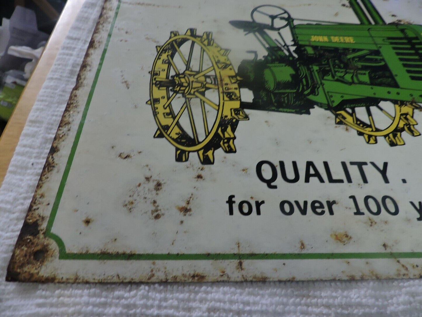 JOHN DEERE TRACTOR " QUALITY...FOR OVER 100 YEARS" METAL SIGN 16X12 INCHES