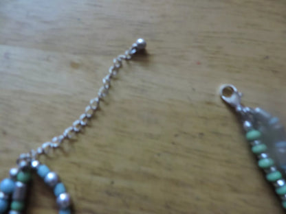 BLUE/SILVER BEADED NECKLACE WITH 5 CRUCIFIXES