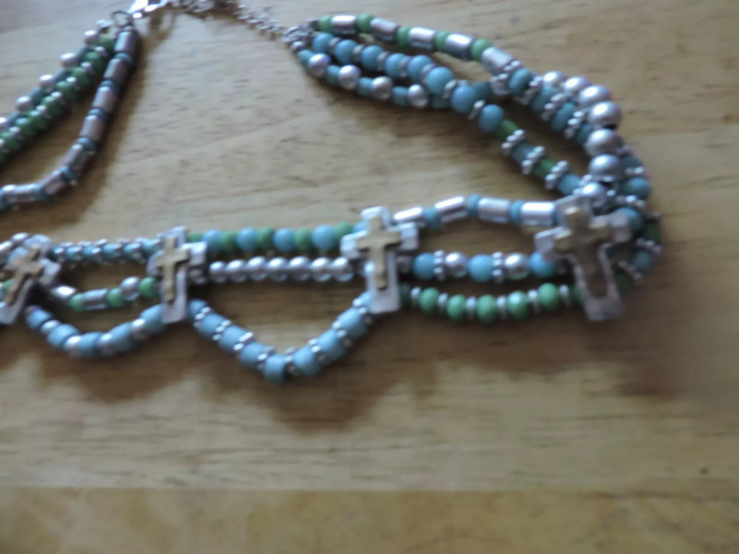 BLUE/SILVER BEADED NECKLACE WITH 5 CRUCIFIXES