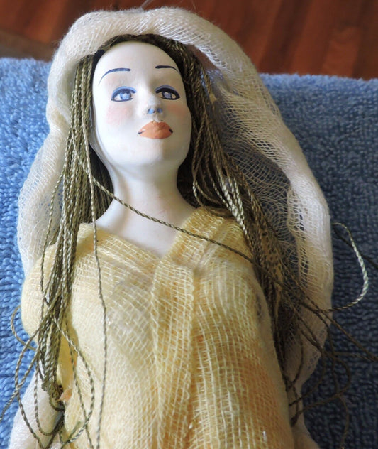 Vintage ceramic doll with long flowing dress-Wall Art