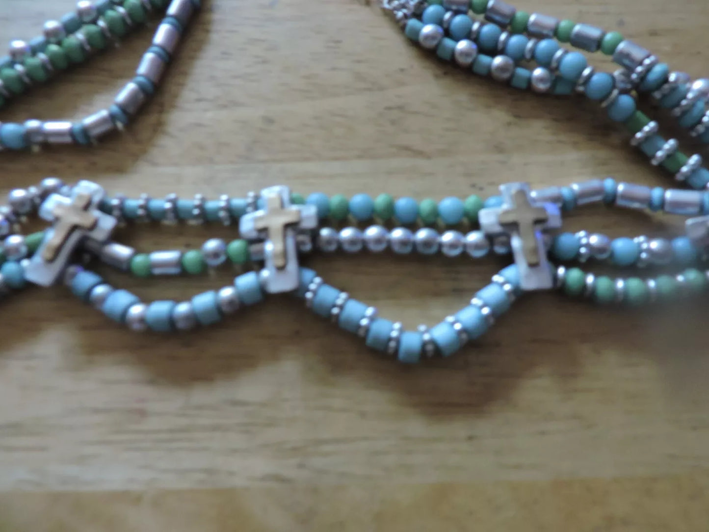 BLUE/SILVER BEADED NECKLACE WITH 5 CRUCIFIXES